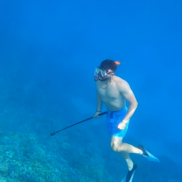 snorkeling Hurghada Red Sea group swimming coral reef