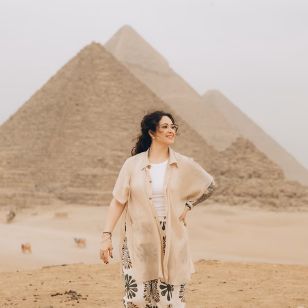 Traveler walking at Giza Pyramids during Cairo tour from El Gouna with Book Egypt Travel