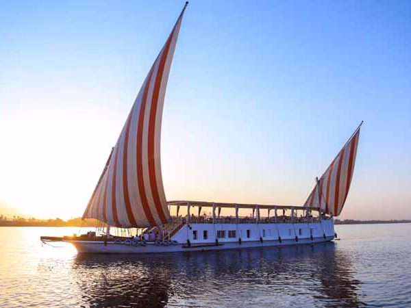 5 Days Three Pyramids Dahabiya from Luxor sailing on the Nile at sunset