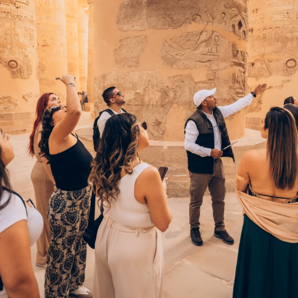 tourists with Egyptologist guide Karnak Temple Luxor East Bank Egypt tour
