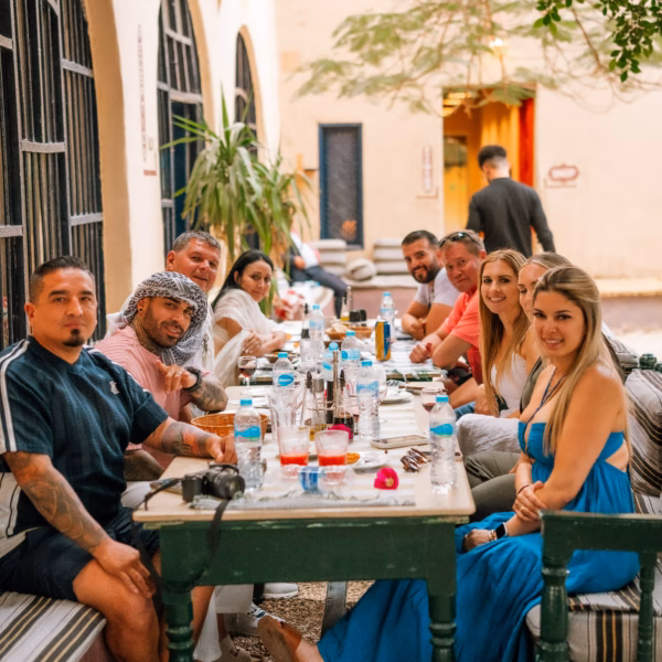 tourists enjoying Egyptian dinner experience local restaurant Egypt travel group