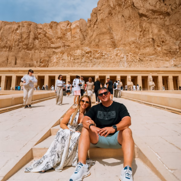 Couple relaxing at Temple of Hatshepsut in Luxor during 3 Days Trip to Cairo Luxor & Aswan from Hurghada