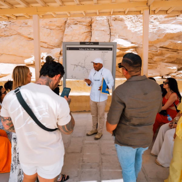 Egyptologist guide explaining Valley of the Kings during 3 Days Trip to Cairo Luxor & Aswan from Hurghada