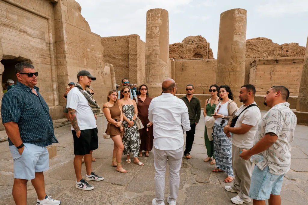 Tourists exploring Abu Simbel temples during a private Aswan day tour