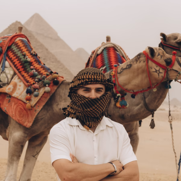 Camel ride experience at Giza Pyramids during Cairo tour from Alexandria Port with Book Egypt Travel
