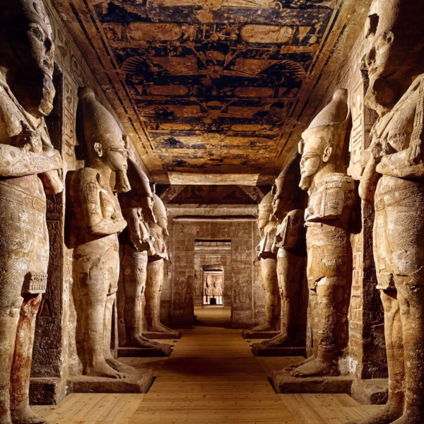 Exquisite ancient temple wall engravings featuring the lucky winged scarab, a highlight of guided tours in Egypt.