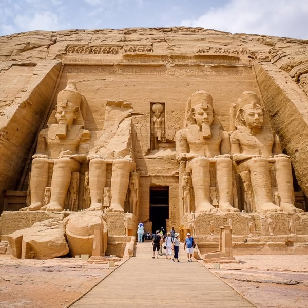 Guided tours to Abu Simbel Temple in Aswan featuring the colossal statues of Ramses II.