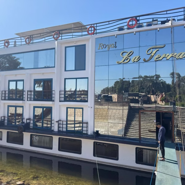 The Royal La Terrasse cruise ship docked on the Nile, a luxurious way to experience Egypt travel and sightseeing.