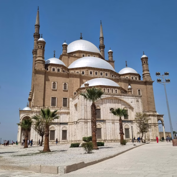 The grand Mosque of Muhammad Ali at the Cairo Citadel under a clear blue sky, a top landmark for Egypt travel.