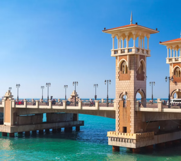 The historic Stanley Bridge in Alexandria spanning the Mediterranean Sea, a picturesque Egypt travel landmark.