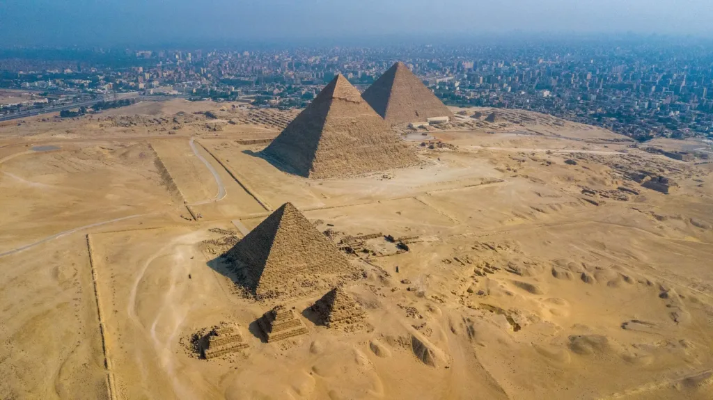 Aerial view of the Giza Pyramids overlooking Cairo, Egypt