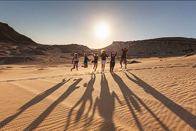 Group enjoying a desert safari adventure in Hurghada